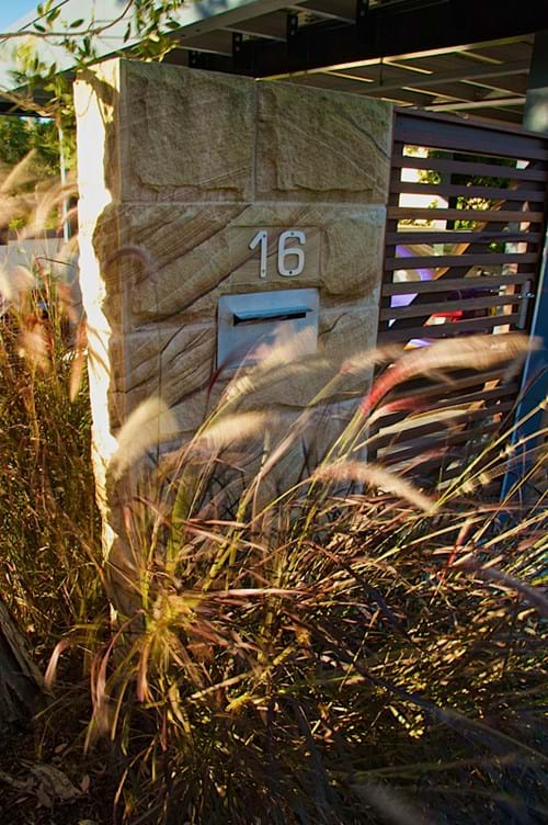 Sandstone pillar with timber gate